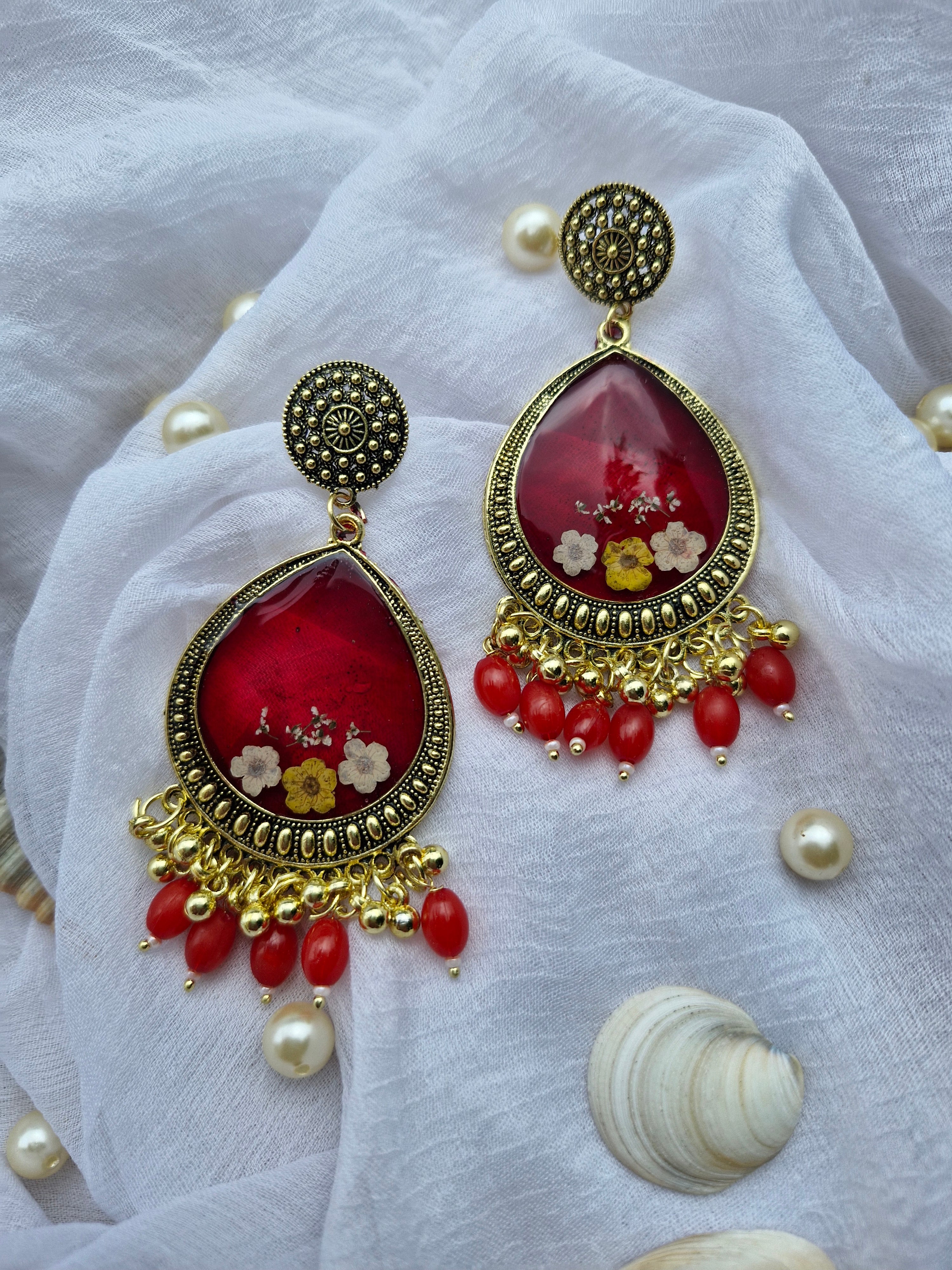 Ruby Bloom Jumka Earrings – Regal Petals Collection
