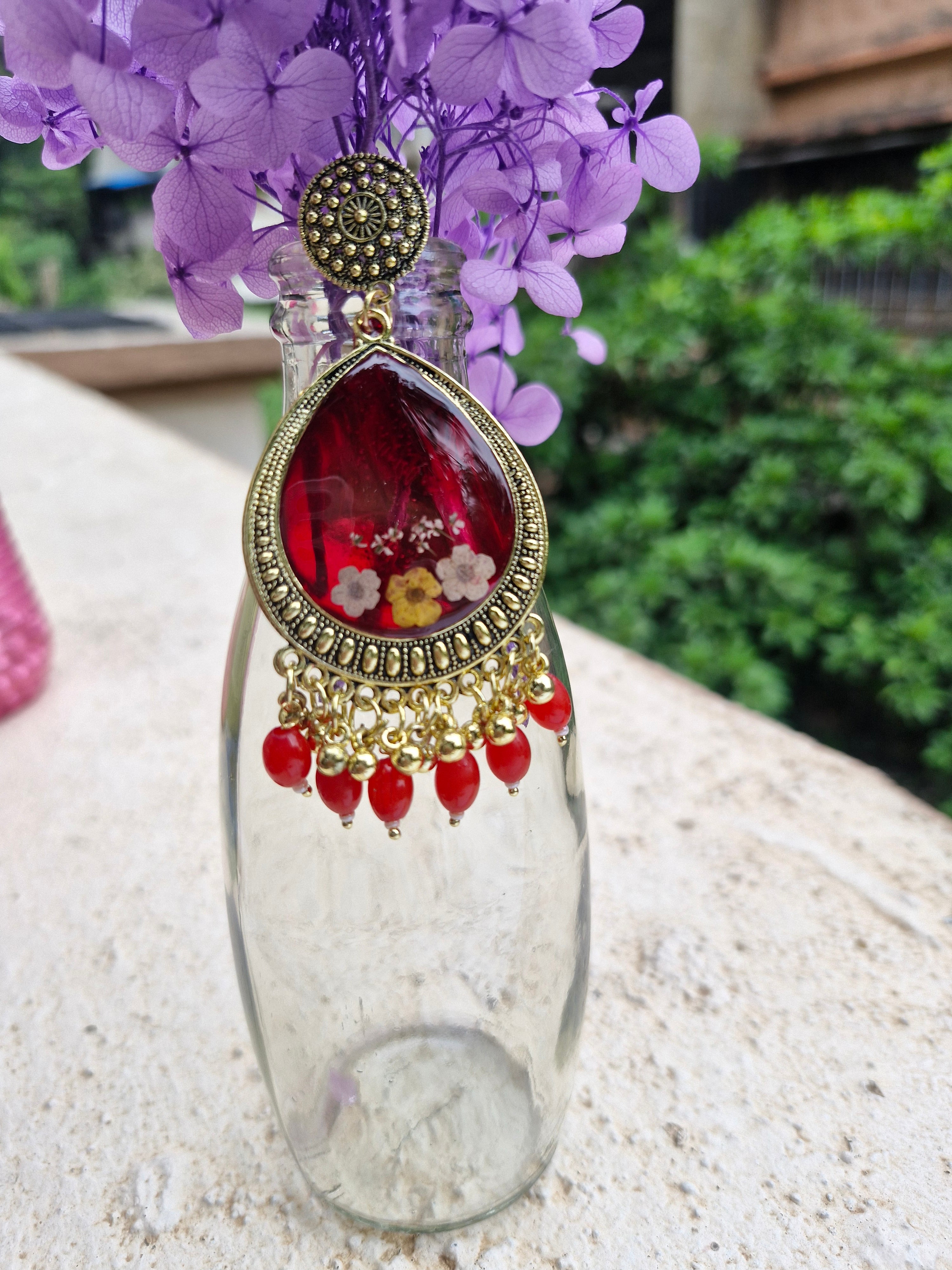 Ruby Bloom Jumka Earrings – Regal Petals Collection